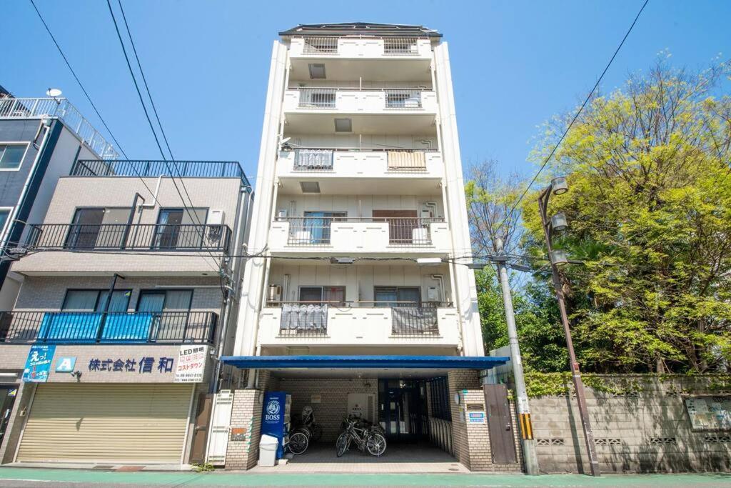 Апартаменты Sanacion Motomachi 7 なんばで150平米の広々空間 最大14名 Netflix見れます Осака Экстерьер фото