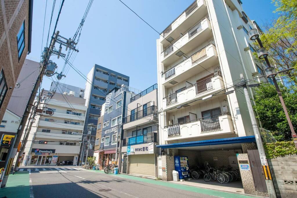Апартаменты Sanacion Motomachi 7 なんばで150平米の広々空間 最大14名 Netflix見れます Осака Экстерьер фото
